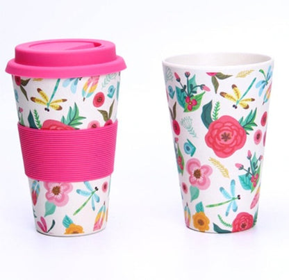 Eco-Friendly Reusable Travel Mug with Multicolored Floral Pattern and Pink Lid