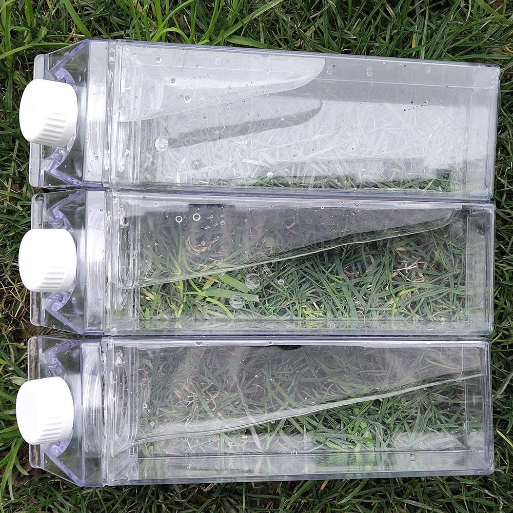 Transparent rectangular reusable water bottle with white cap