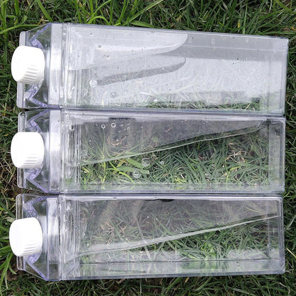 Transparent rectangular reusable water bottle with white cap