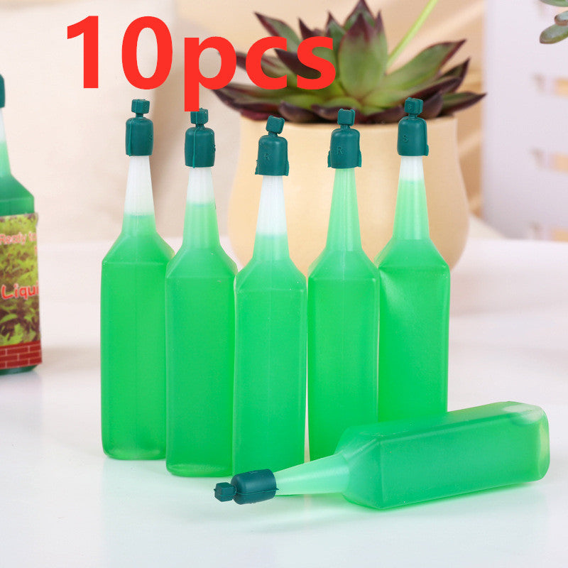 Eco-Friendly Plant Watering Device - Water-Saving Green Bottle