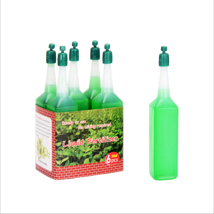 Eco-Friendly Plant Watering Device - Water-Saving Green Bottle