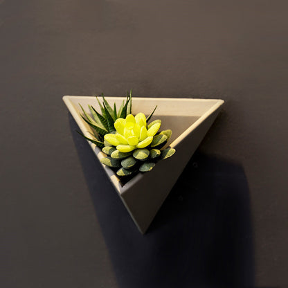 Eco-Friendly Triangular Wall-Mounted Planter for Indoor Greenery
