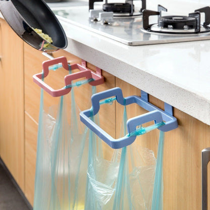 Pink and blue hanging trash bag holder for cabinet doors