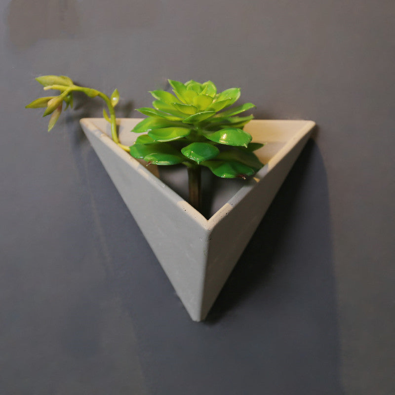 Eco-Friendly Triangular Wall Planter for Indoor Greenery