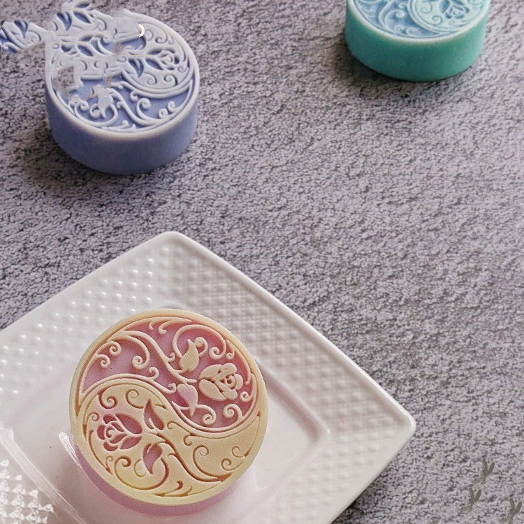 Pastel decorative soap bars with floral and swirl designs