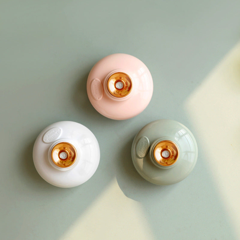 Eco-Friendly Refillable Soap Dispenser in Pink, White, and Green