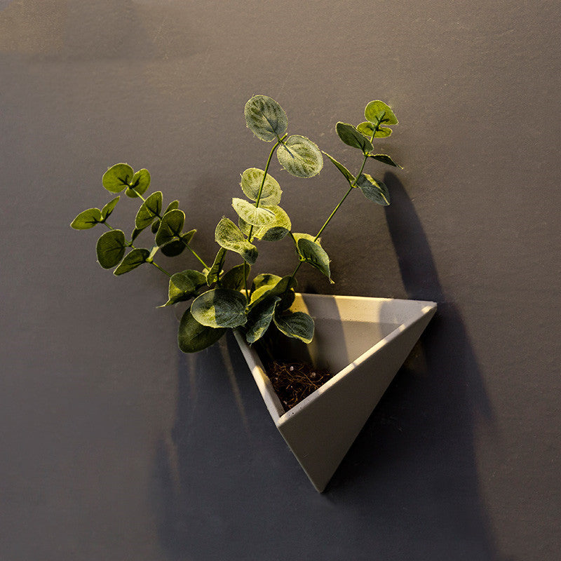 Eco-Friendly Triangular Wall Planter for Indoor Greenery