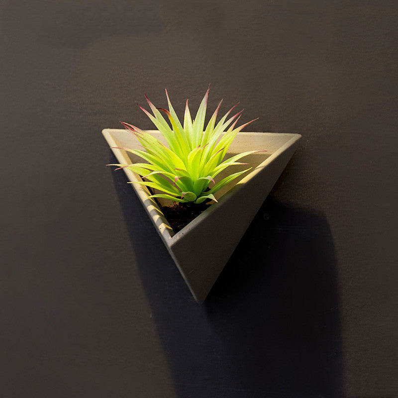 Eco-Friendly Triangular Wall Planter for Indoor Greenery