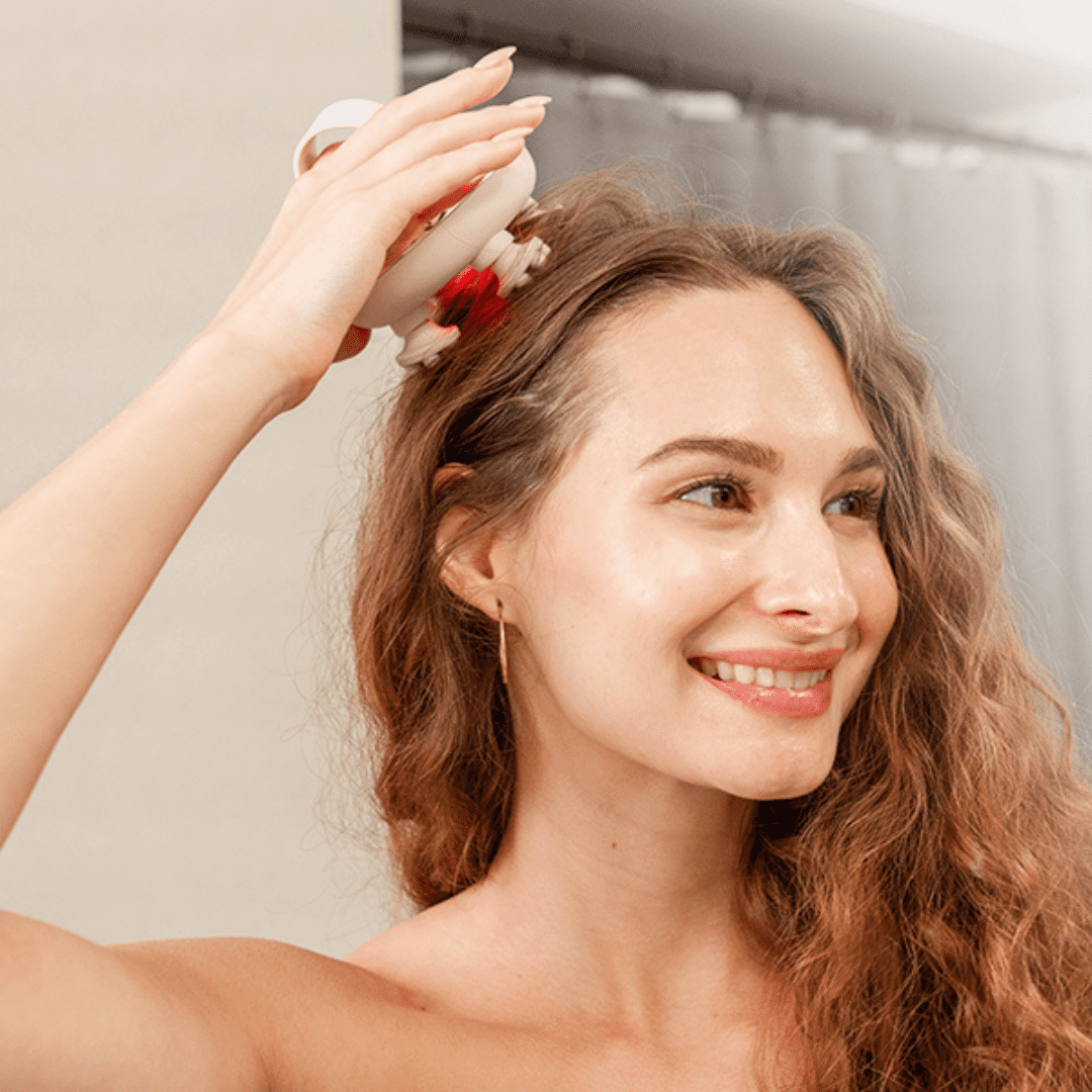 Blonde Girl Using the ZenGlow Scalp Massager