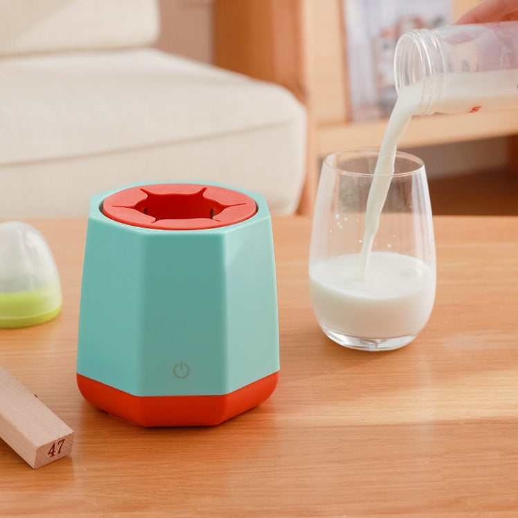 Light blue electric milk frother with red accents and hexagonal base