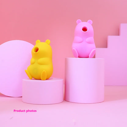 Silicone bear-shaped toothbrush holders in yellow and pink