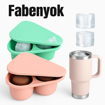 Green and pink triangular silicone ice cube tray with round compartments