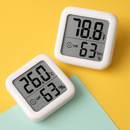Compact Digital Thermo-Hygrometer with White Casing and Black Display