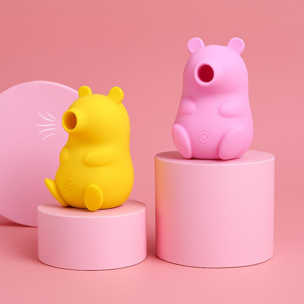 Silicone bear-shaped toothbrush holders in yellow and pink