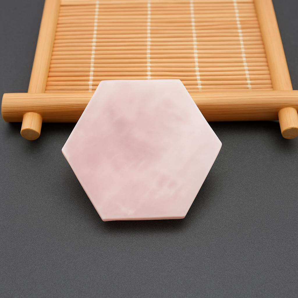 Light pink hexagonal soap bar made from natural ingredients