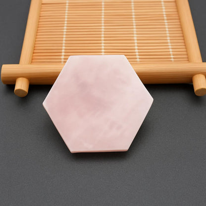 Light pink hexagonal soap bar made from natural ingredients
