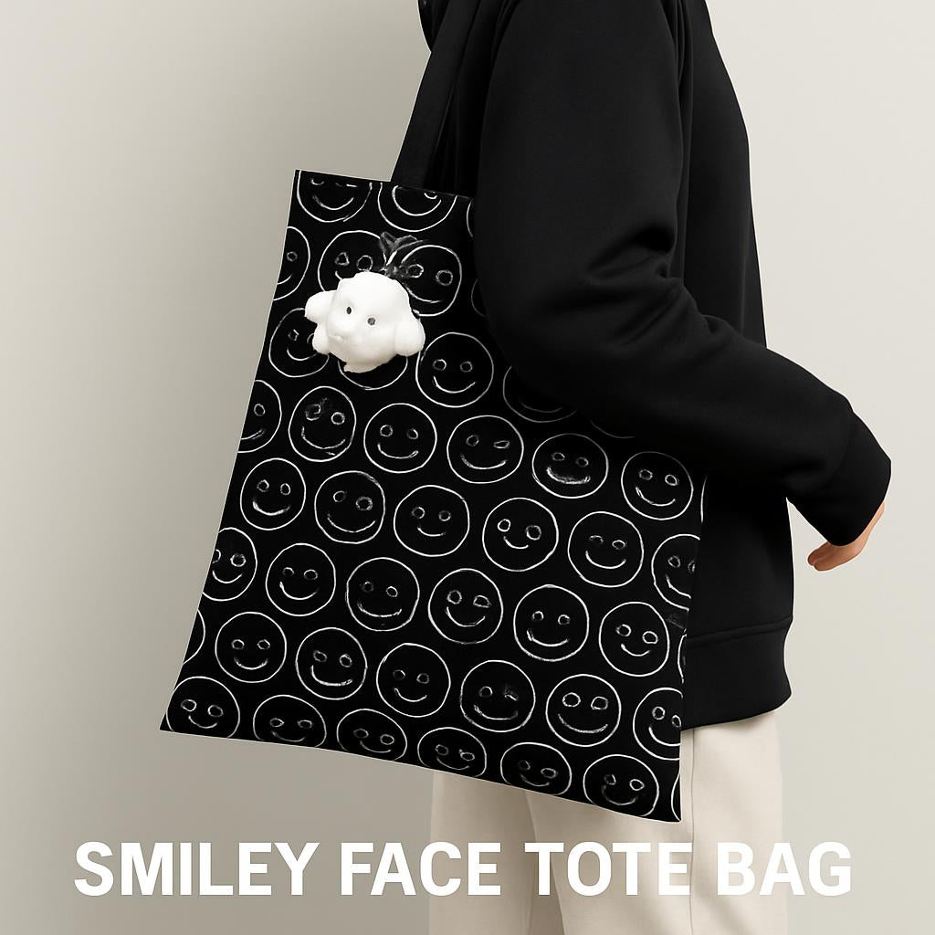 Black tote bag with white smiley face pattern