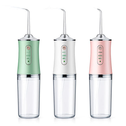 Eco-Friendly Portable Water Flosser in Green, White, and Pink