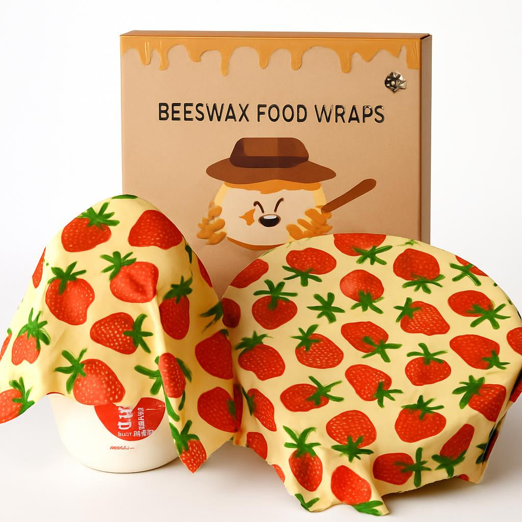 Yellow beeswax food wraps with red strawberry pattern