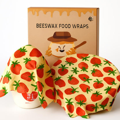 Yellow beeswax food wraps with red strawberry pattern