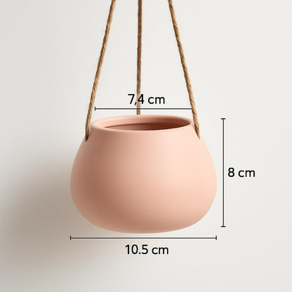 Light pink ceramic hanging planter with a wide opening