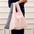 Pink model for the Reusable shopping bags from Exultplanet.com